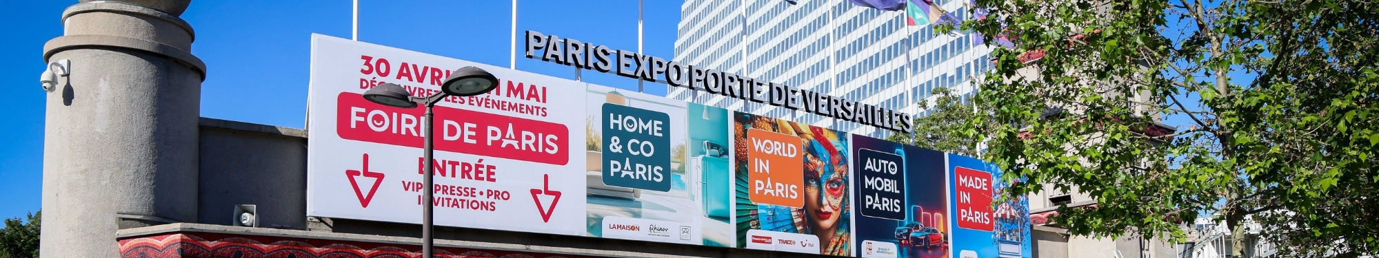 entree de la foire avec affiches des 4 événements